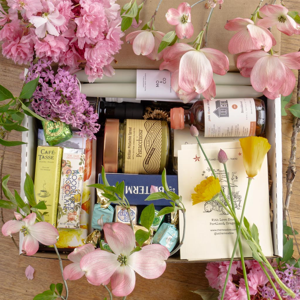 mother's day gift box with chocolate, salts, flowers and more