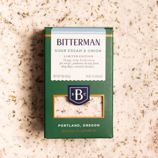 Bitterman Sour Cream & Onion seasoning box on a bed of salt