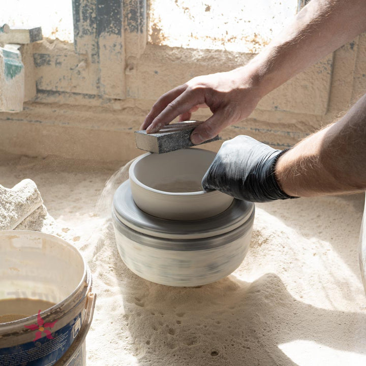 potter at work in sifnos stoneware in sifnos, greece