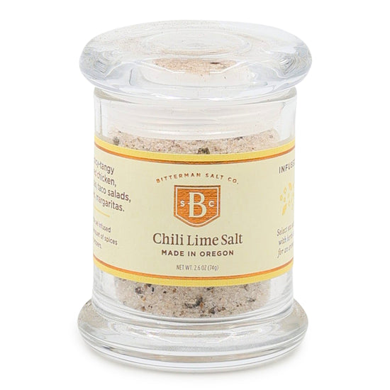 Jar of chili lime salt with a label on a white background