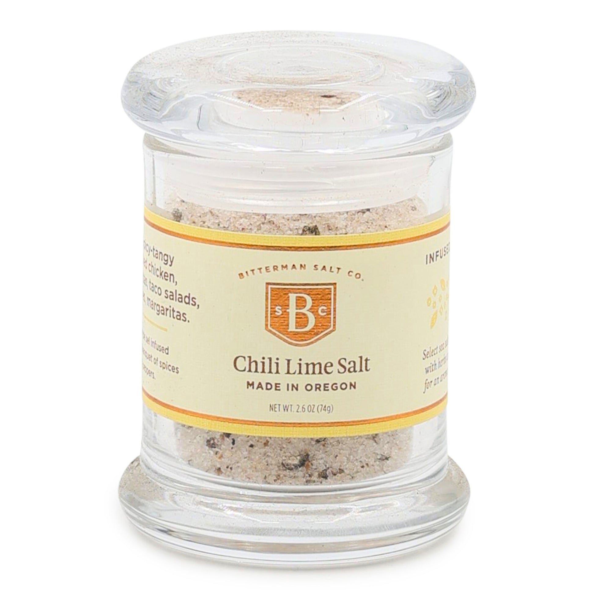 Jar of chili lime salt with a label on a white background