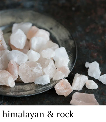 Himalayan and rock salt crystals on a dark surface with 'himalayan & rock' text.