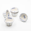 5 salt cellars on white background