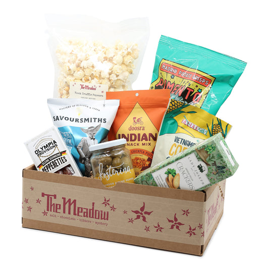 A Meadow box filled with various snacks