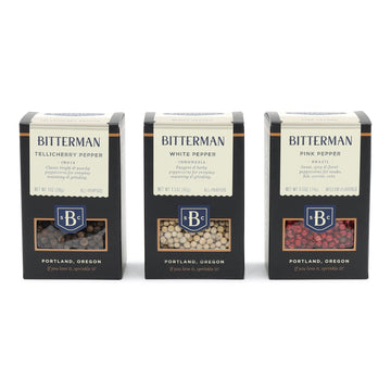 Three Bitterman pepper boxes on a white background