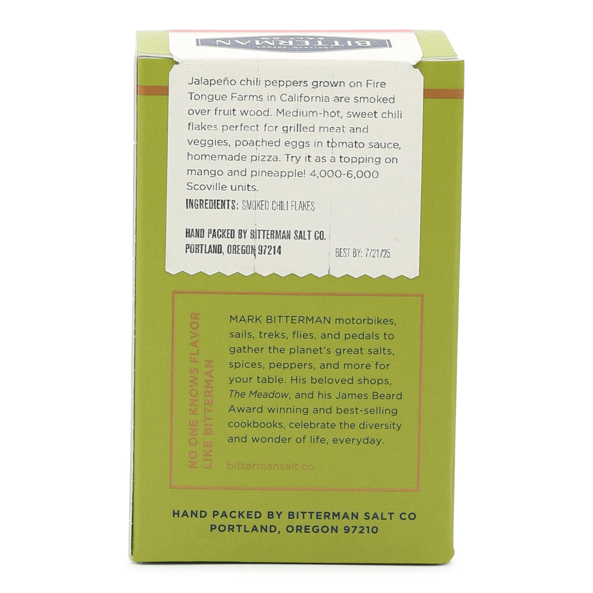 Green box with white label containing text and branding on a white background
