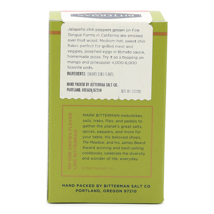 Green box with white label containing text and branding on a white background