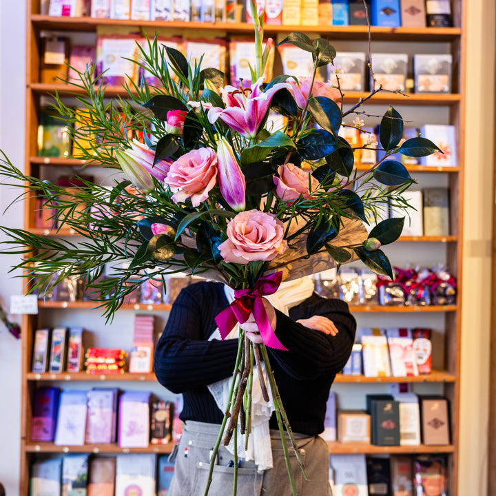 Shop Guide Holding beautiful flower bouquet