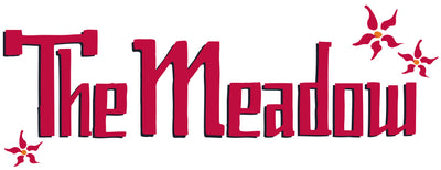 the meadow logo with flowers