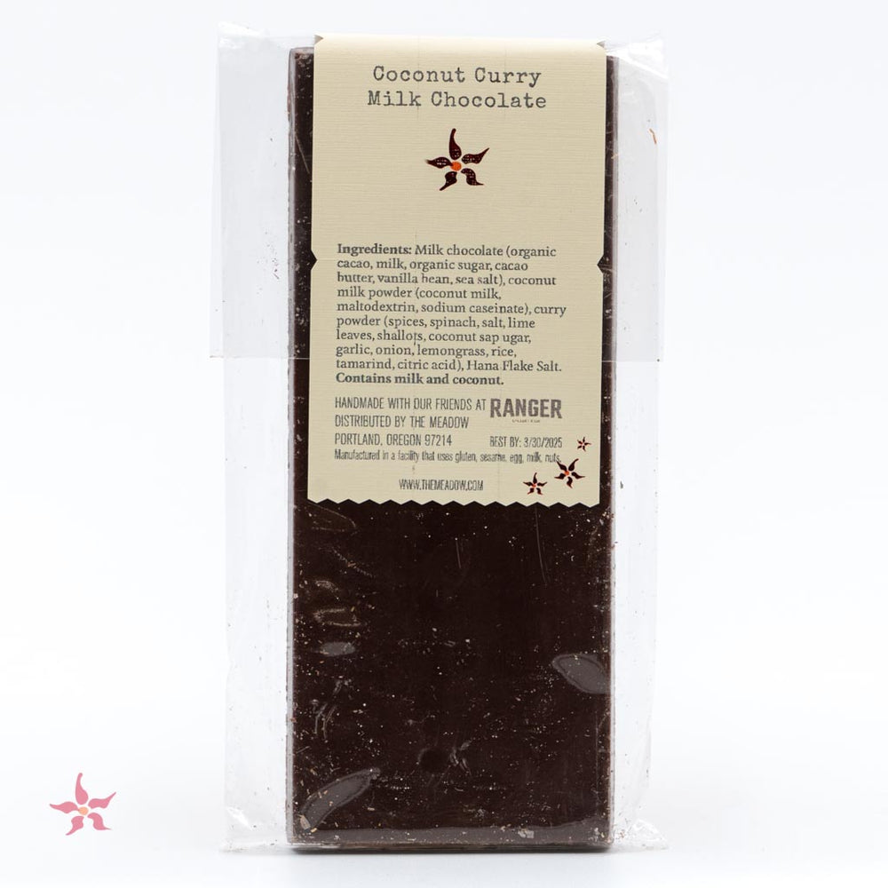 Image of the back of The Meadow Milk Chocolate with Coconut Curry