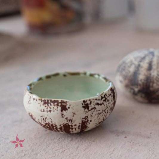 sea urchin salt cellar made by sifnos stoneware in sifnos, greece